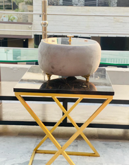 Grey Turkish Hotpot on a table in patio